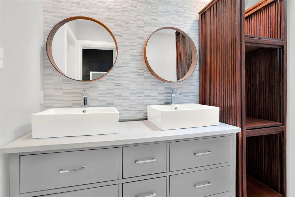 3048 Airhaven Street Dallas, TX 75229 - Photo 8 of 14 a bathroom with 2 sink and a mirror