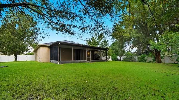 a house with a tree in front of it