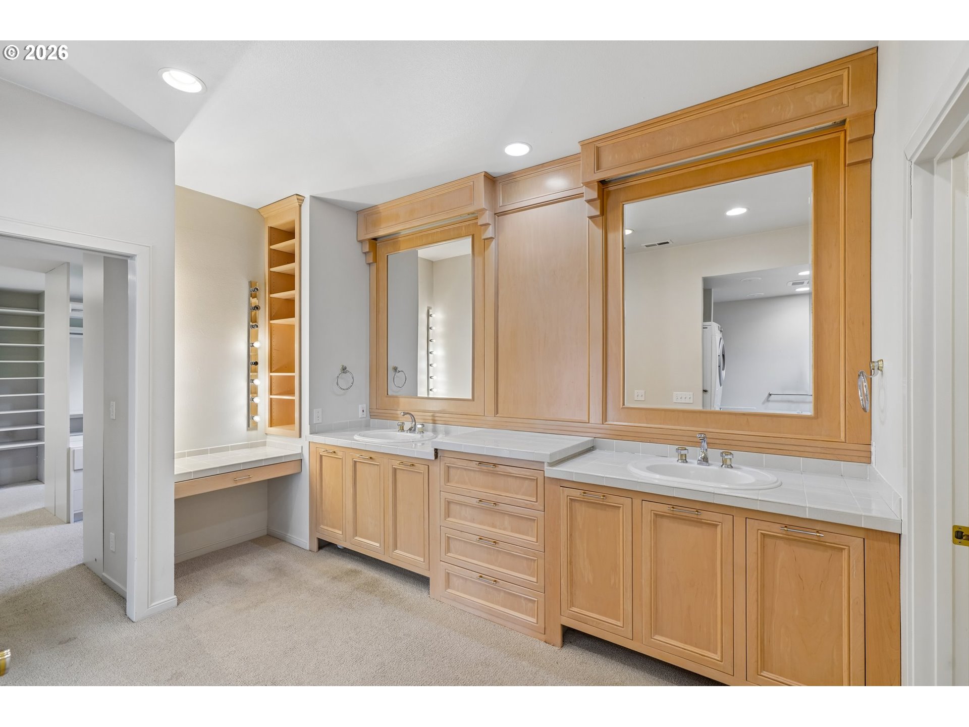 7600 Southwest Northvale Way Portland, OR 97225 - Photo 23 of 46 a bathroom with a sink a mirror and a bathtub