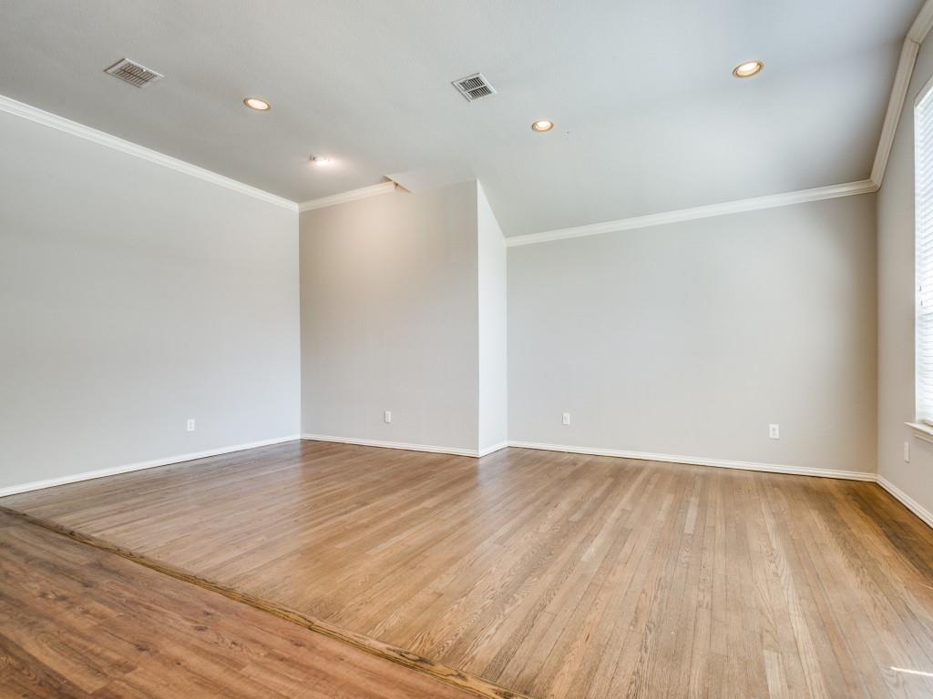 5924 Legend Lane The Colony, TX 75056 - Photo 2 of 27 a view of an empty room with wooden floor