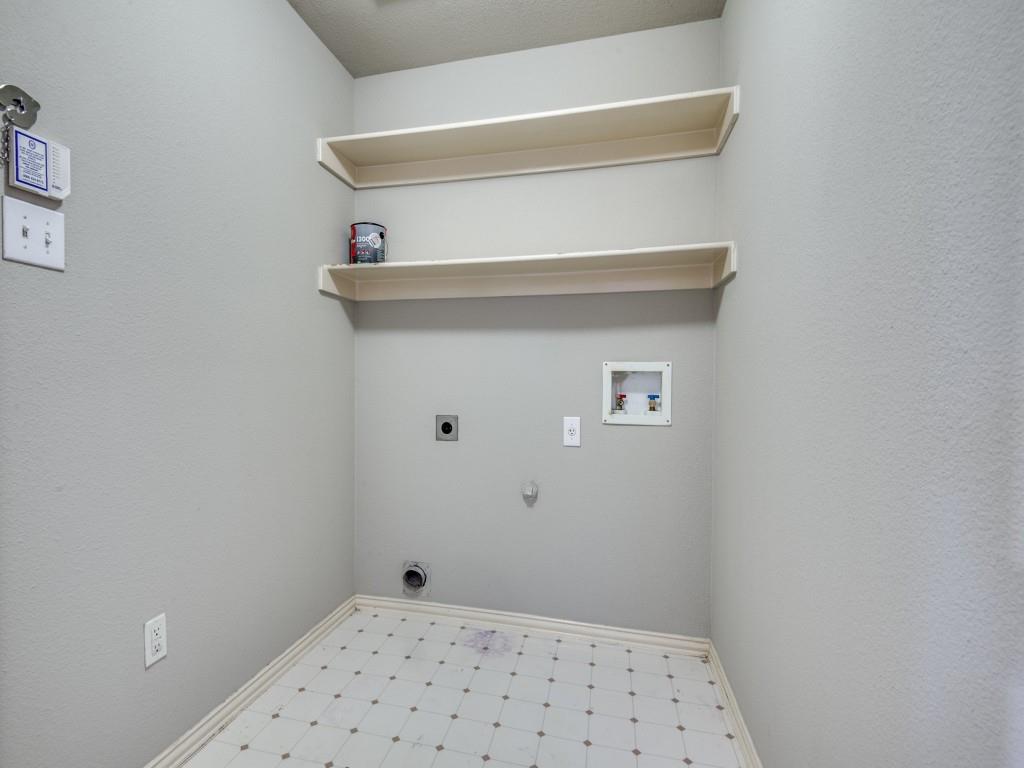 5924 Legend Lane The Colony, TX 75056 - Photo 23 of 27 a view of small space with racks on the wall