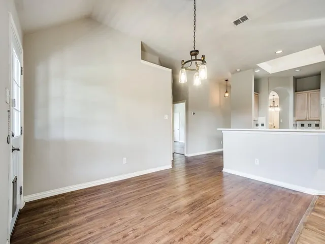 a view of a kitchen from the hallway