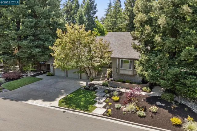 front view of a house with a small yard