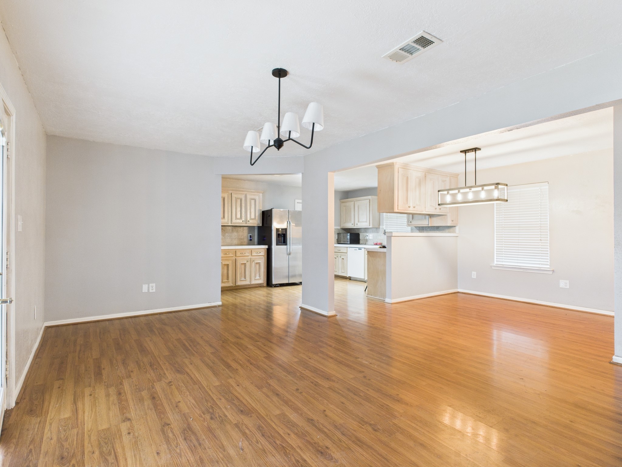 10130 Sussex Lane Houston, TX 77041 - Photo 5 of 20 a view of empty room with wooden floor