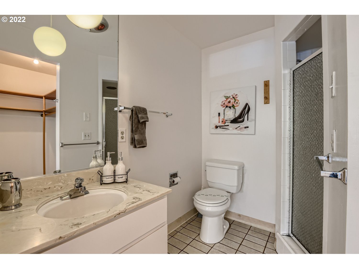 1503 Southwest Hall Street Portland, OR 97201 - Photo 11 of 17 a bathroom with a granite countertop toilet sink and mirror