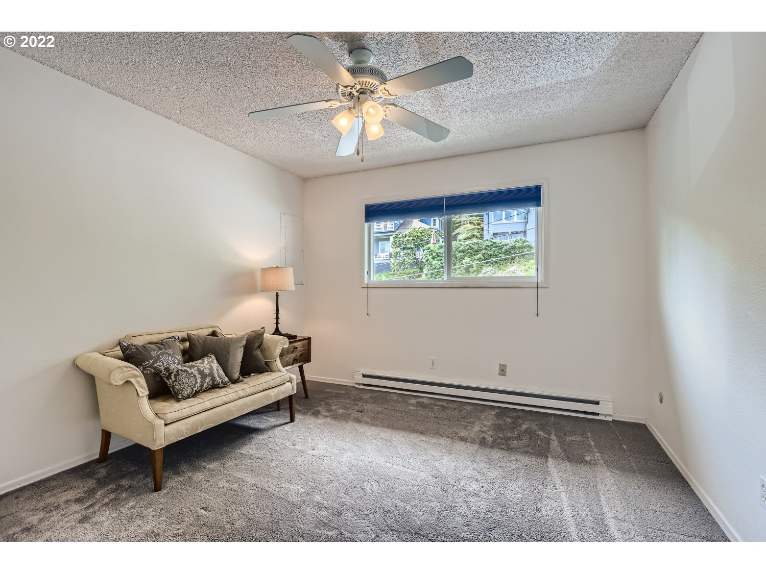 1503 Southwest Hall Street Portland, OR 97201 - Photo 12 of 17 a living room with furniture and a ceiling fan