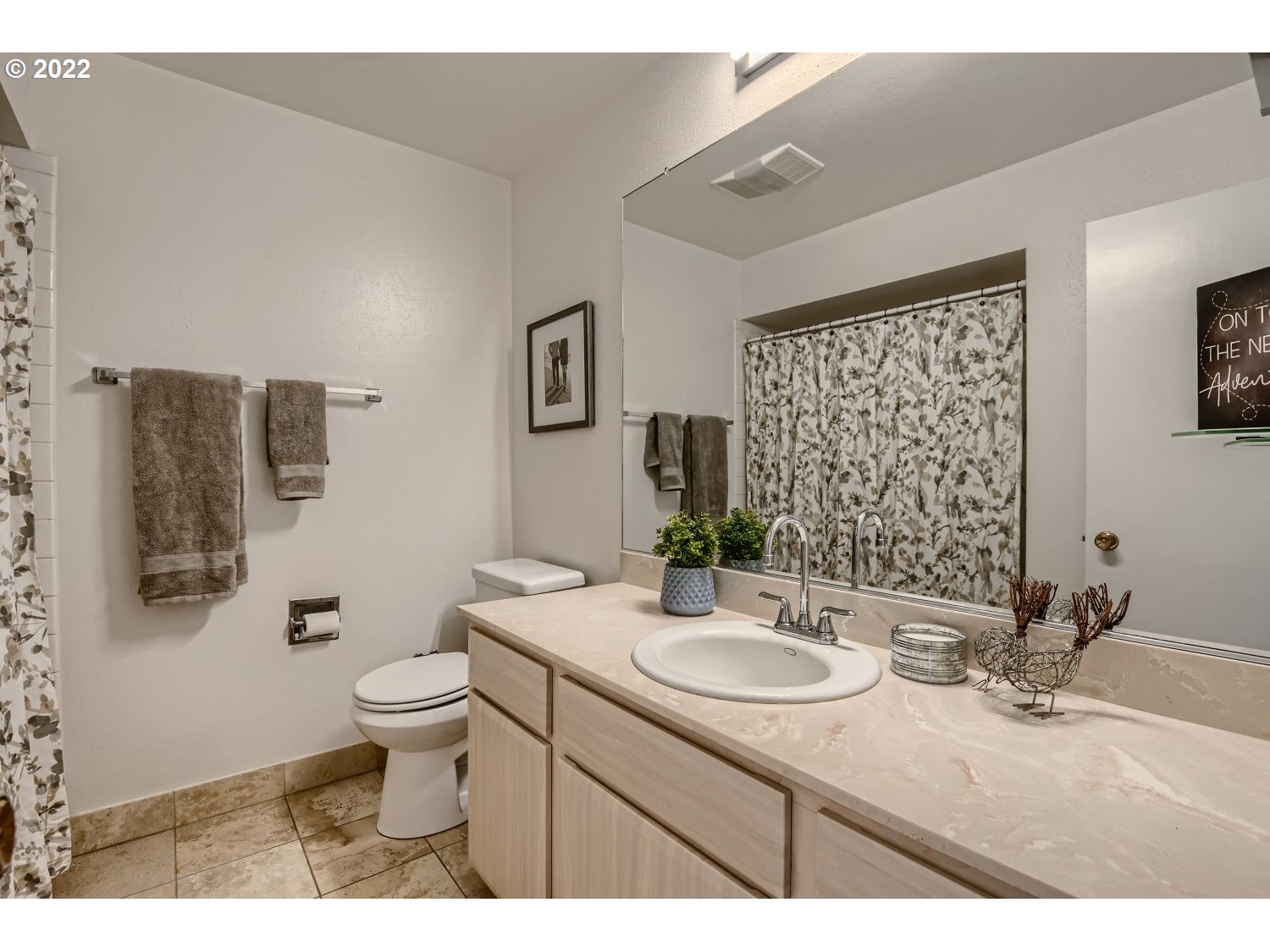 1503 Southwest Hall Street Portland, OR 97201 - Photo 13 of 17 a bathroom with a granite countertop sink toilet and mirror