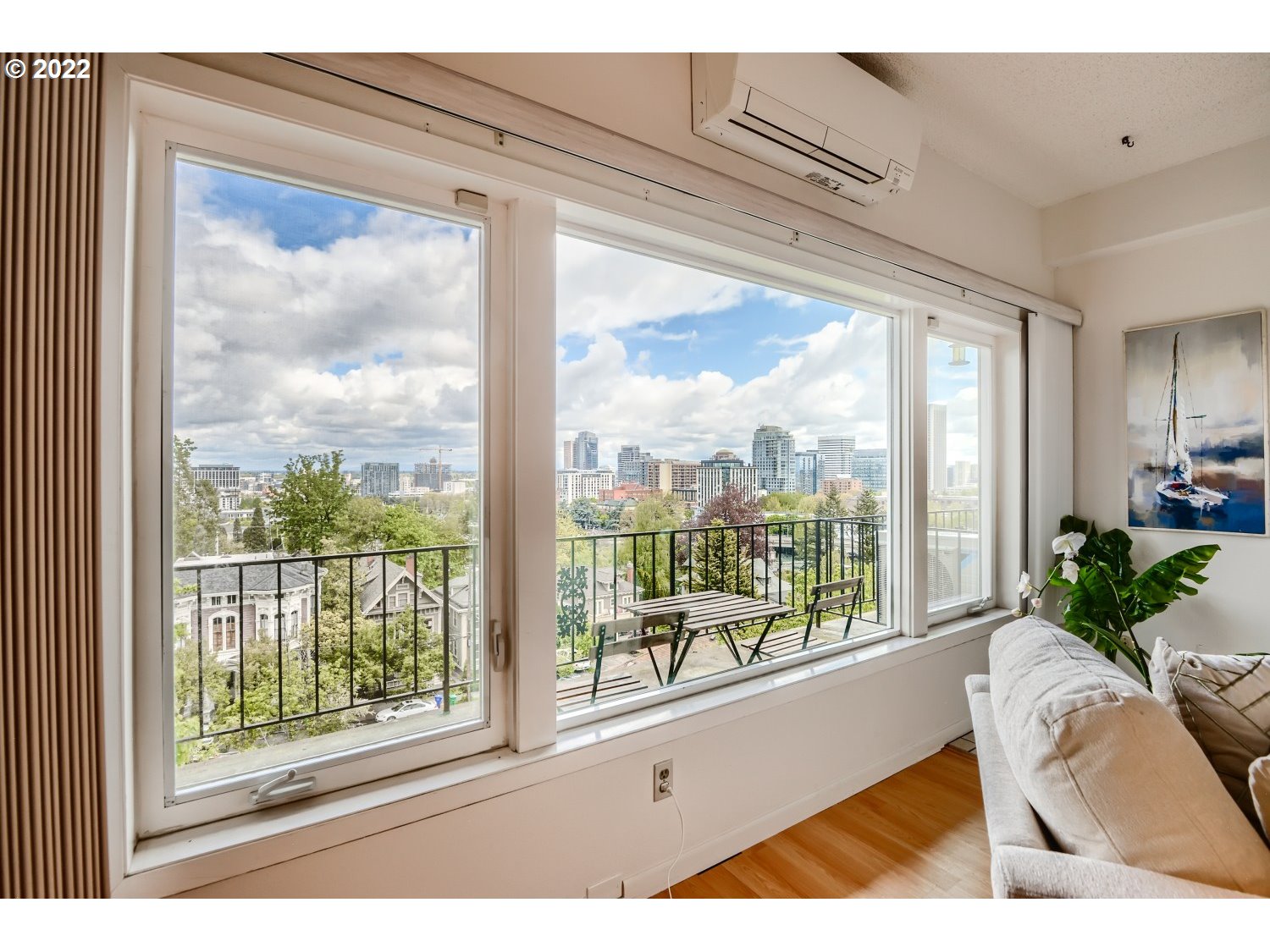 1503 Southwest Hall Street Portland, OR 97201 - Photo 7 of 17 a picture of a floor to ceiling window with wooden floor