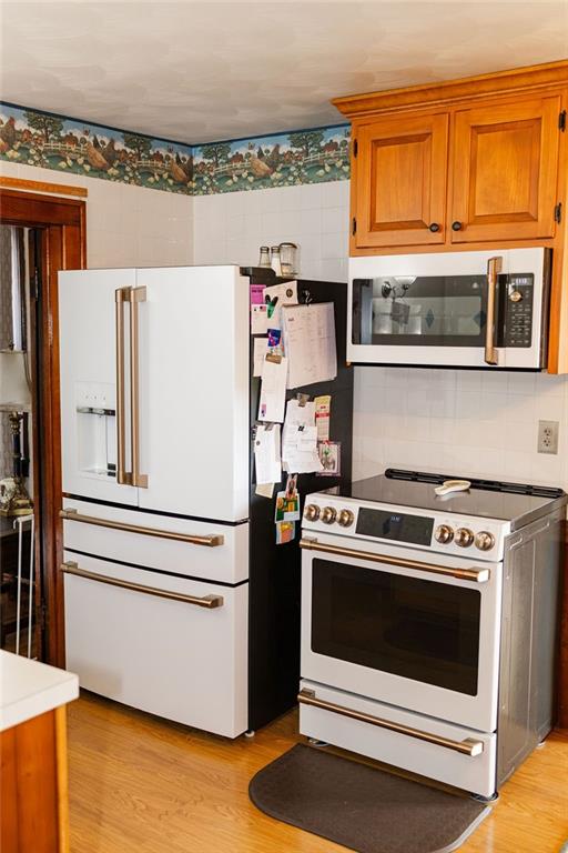 1898 Schellsburg Road Claysburg, PA 16625 - Photo 39 of 50 a kitchen with stainless steel appliances granite countertop a stove and a refrigerator