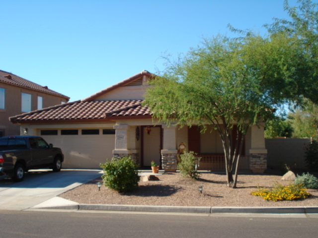 a view of a house with a patio