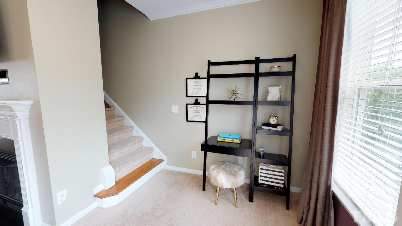 5706 Cameo Glass Way Raleigh, NC 27612 - Photo 12 of 21 This extra space off the family room is perfect for a desk or sitting area!