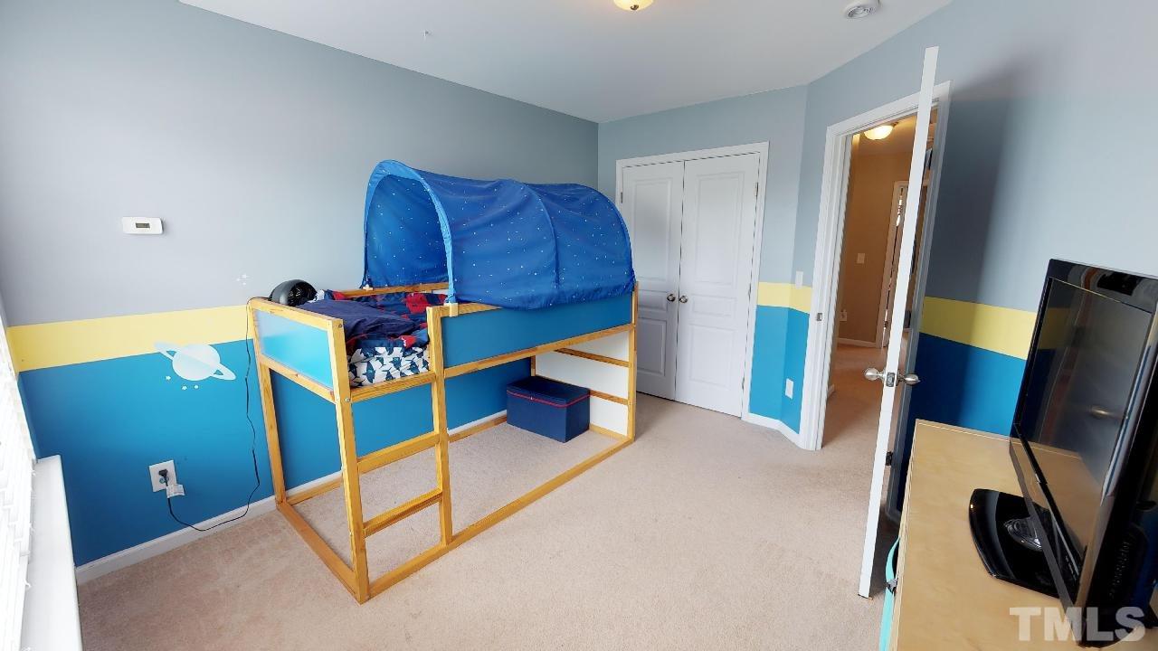 5706 Cameo Glass Way Raleigh, NC 27612 - Photo 16 of 21 Large bedroom upstairs!