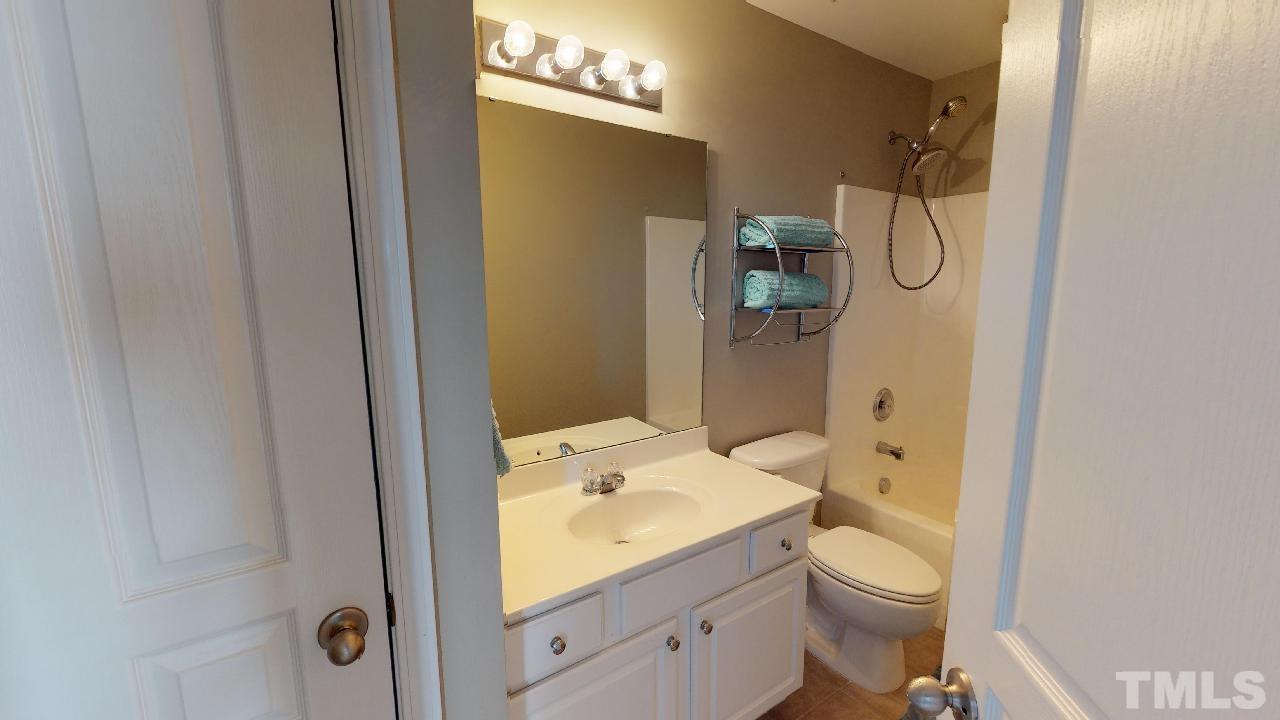 5706 Cameo Glass Way Raleigh, NC 27612 - Photo 17 of 21 This third floor bath is convenient to the second and third bedroom!