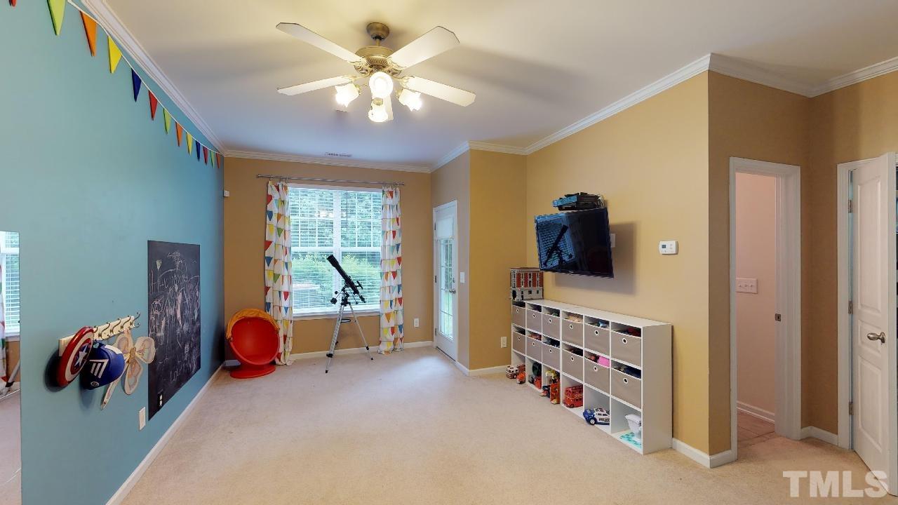 5706 Cameo Glass Way Raleigh, NC 27612 - Photo 4 of 21 There is a door leading to the patio and backyard from this room downstairs!