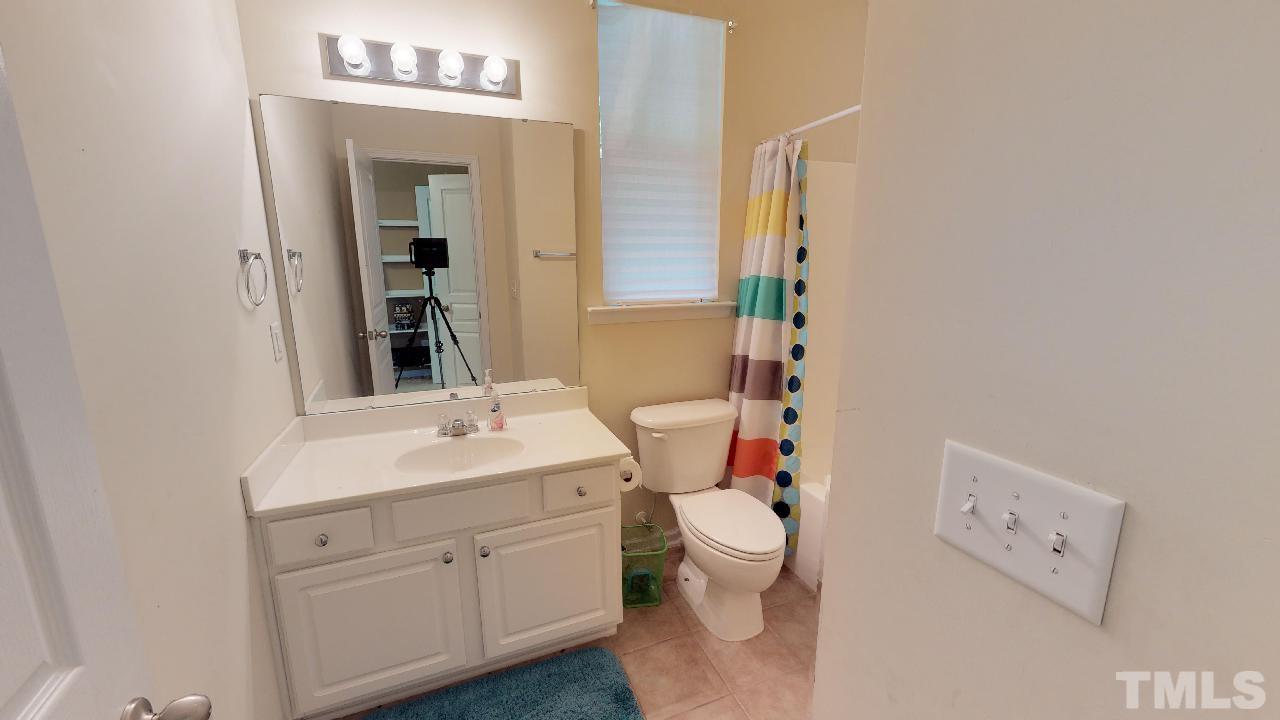 5706 Cameo Glass Way Raleigh, NC 27612 - Photo 5 of 21 Convenient full bath on first floor!