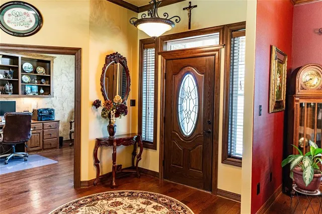 a view of a hallway with washer and dryer