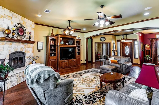 a living room with furniture or outdoor area and a fireplace