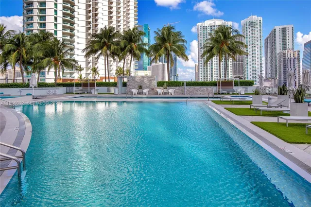 a swimming pool with outdoor view