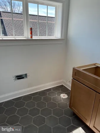 a utility room with a window