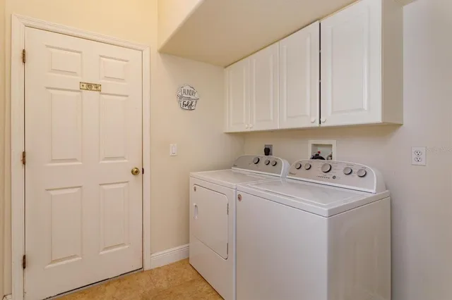 a view of utility room with washer and dryer