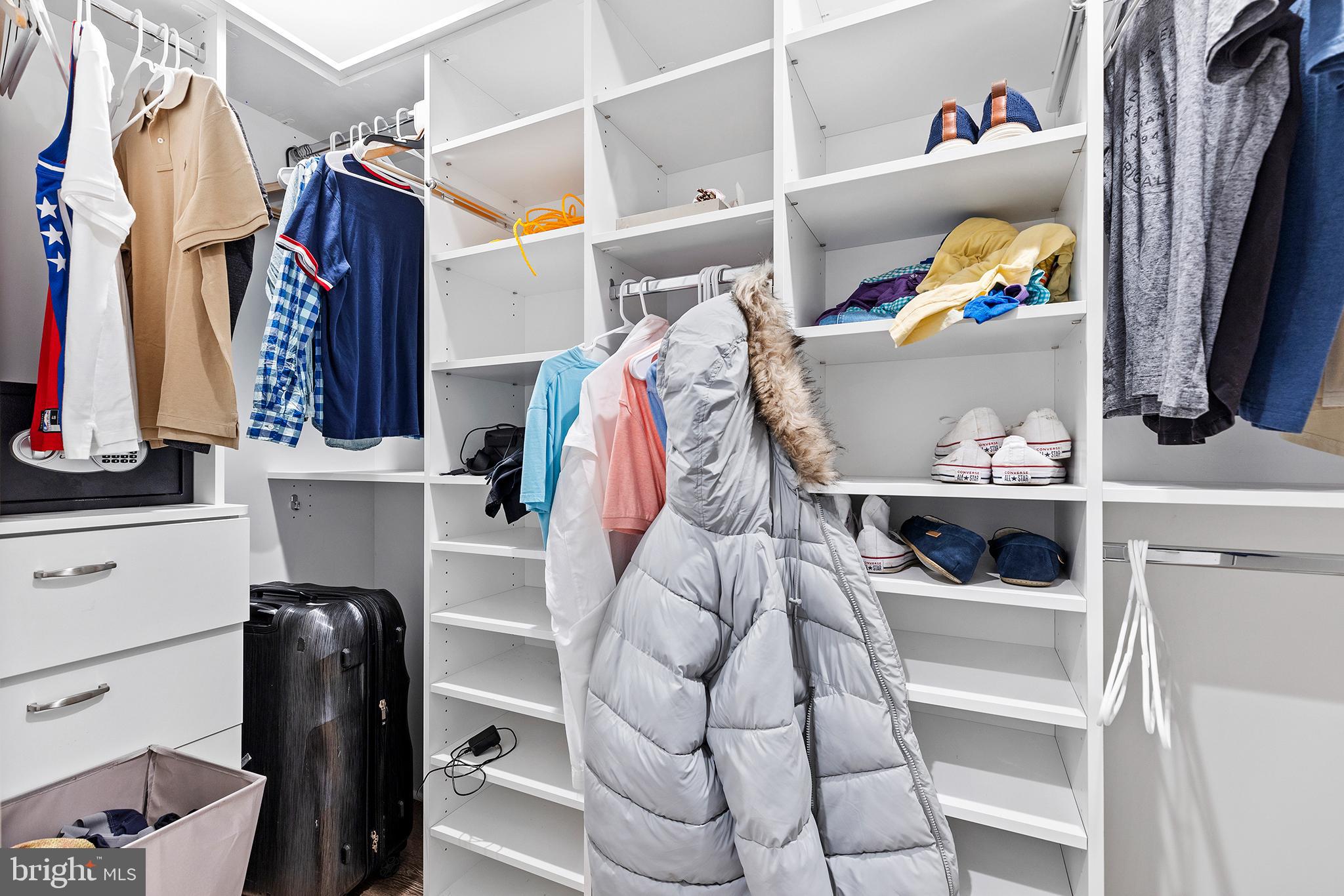 815 Perkiomen Street, Unit 15 Philadelphia, PA 19130 - Photo 21 of 27 a view of walk in closet with clothes and shoes
