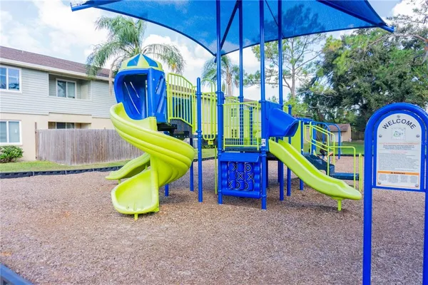 a view of a park with a slide