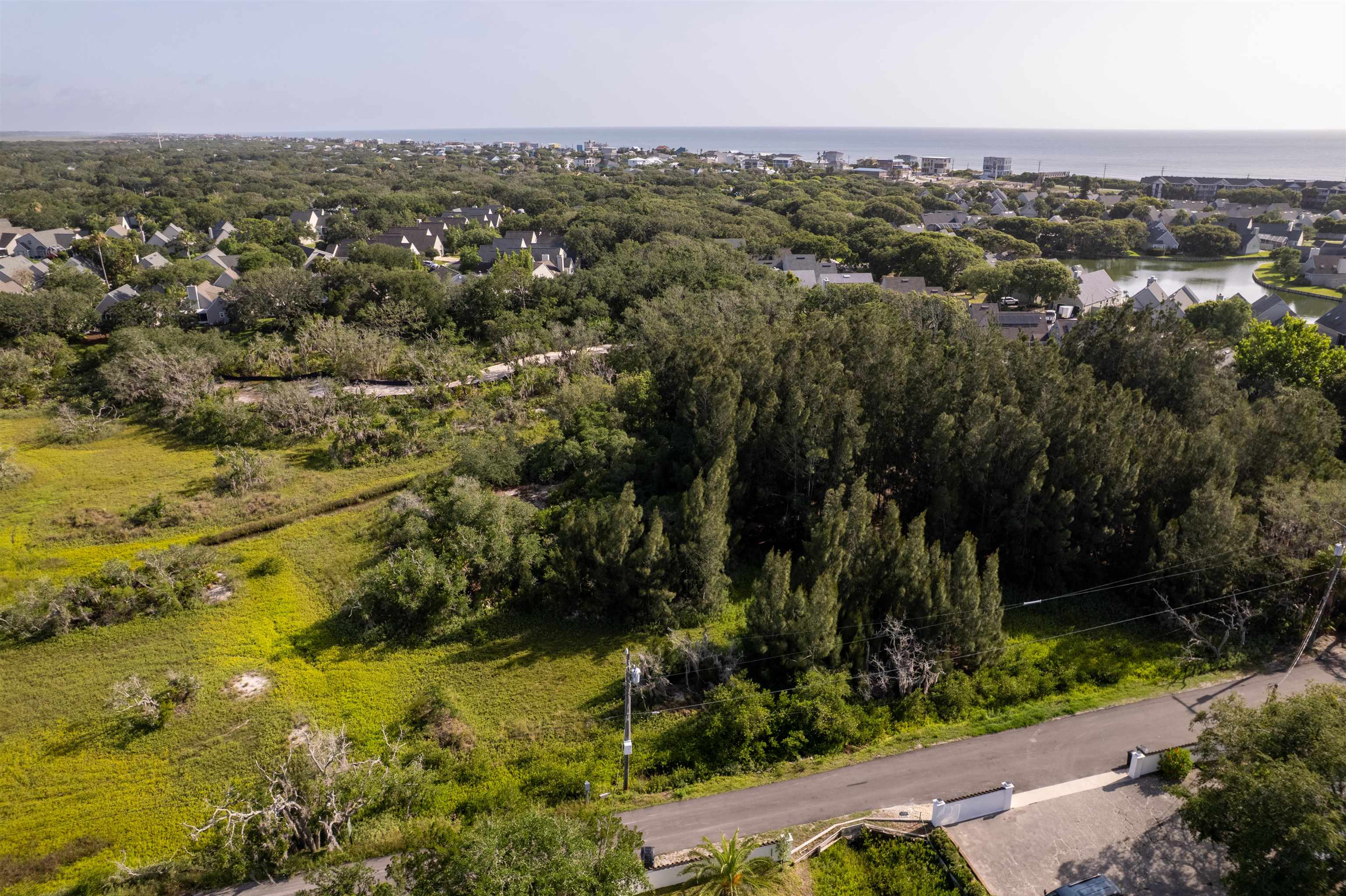 0 Carcaba Road St. Augustine, FL 32084 - Photo 13 of 13 an aerial view of residential house with green space and trees all around