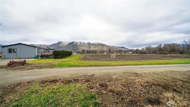 a view of a house with a big yard