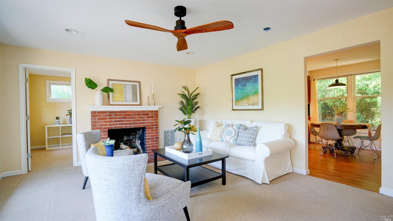 7 Perry Walk San Rafael, CA 94901 - Photo 1 of 1 a living room with furniture and a fireplace