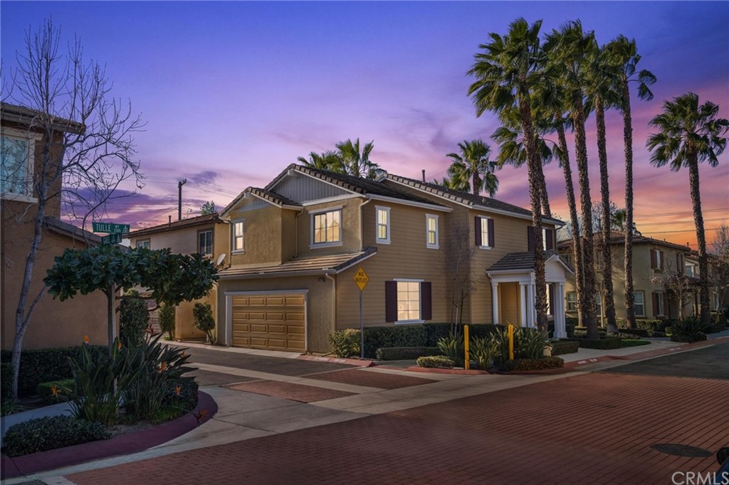 8779 Gael Lane Riverside, CA 92503 - Photo 1 of 1 a front view of a house with a yard and tree s