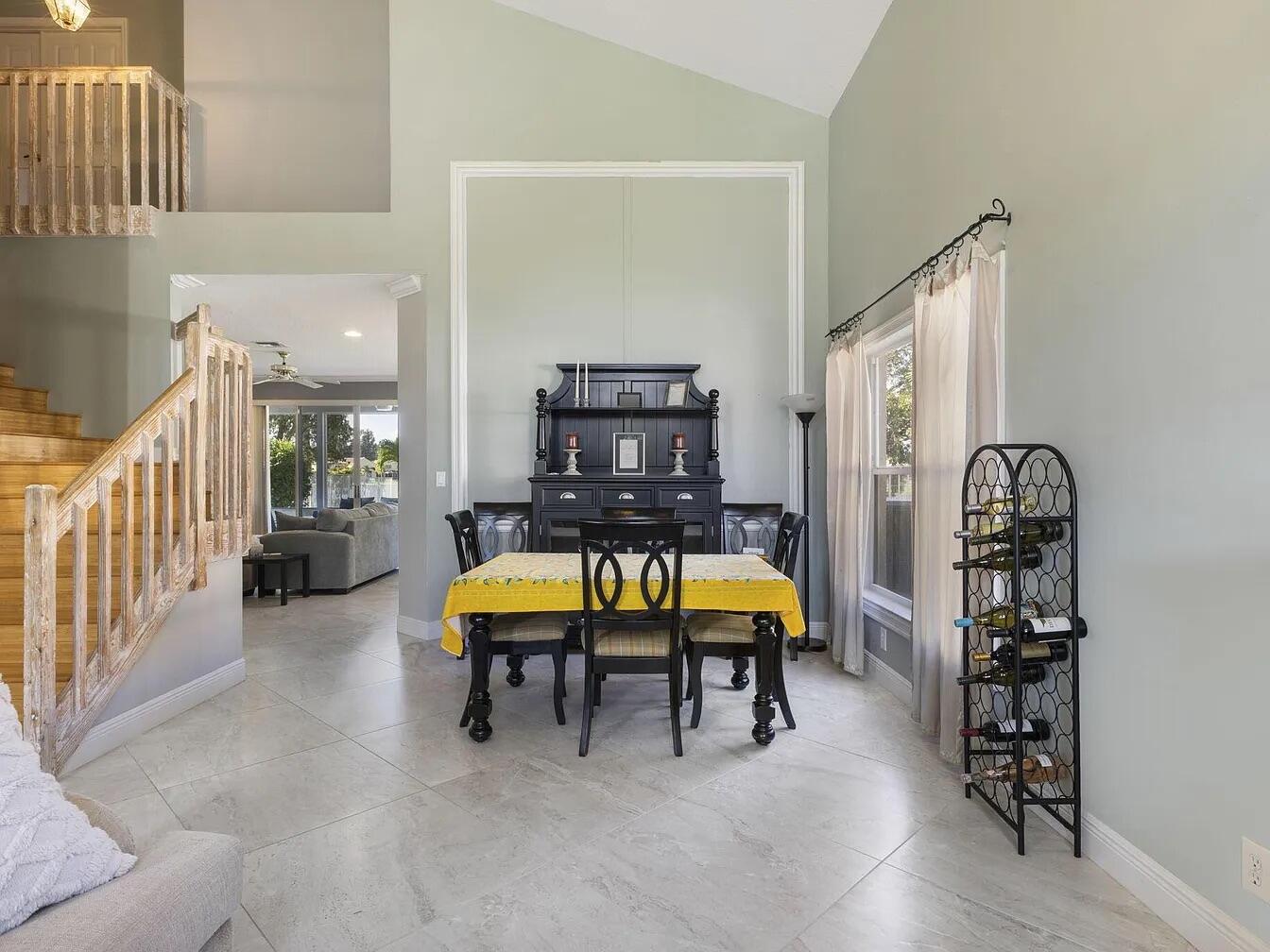 7782 Hoffy Circle Lake Worth, FL 33467 - Photo 4 of 27 en swimming pool with chairs