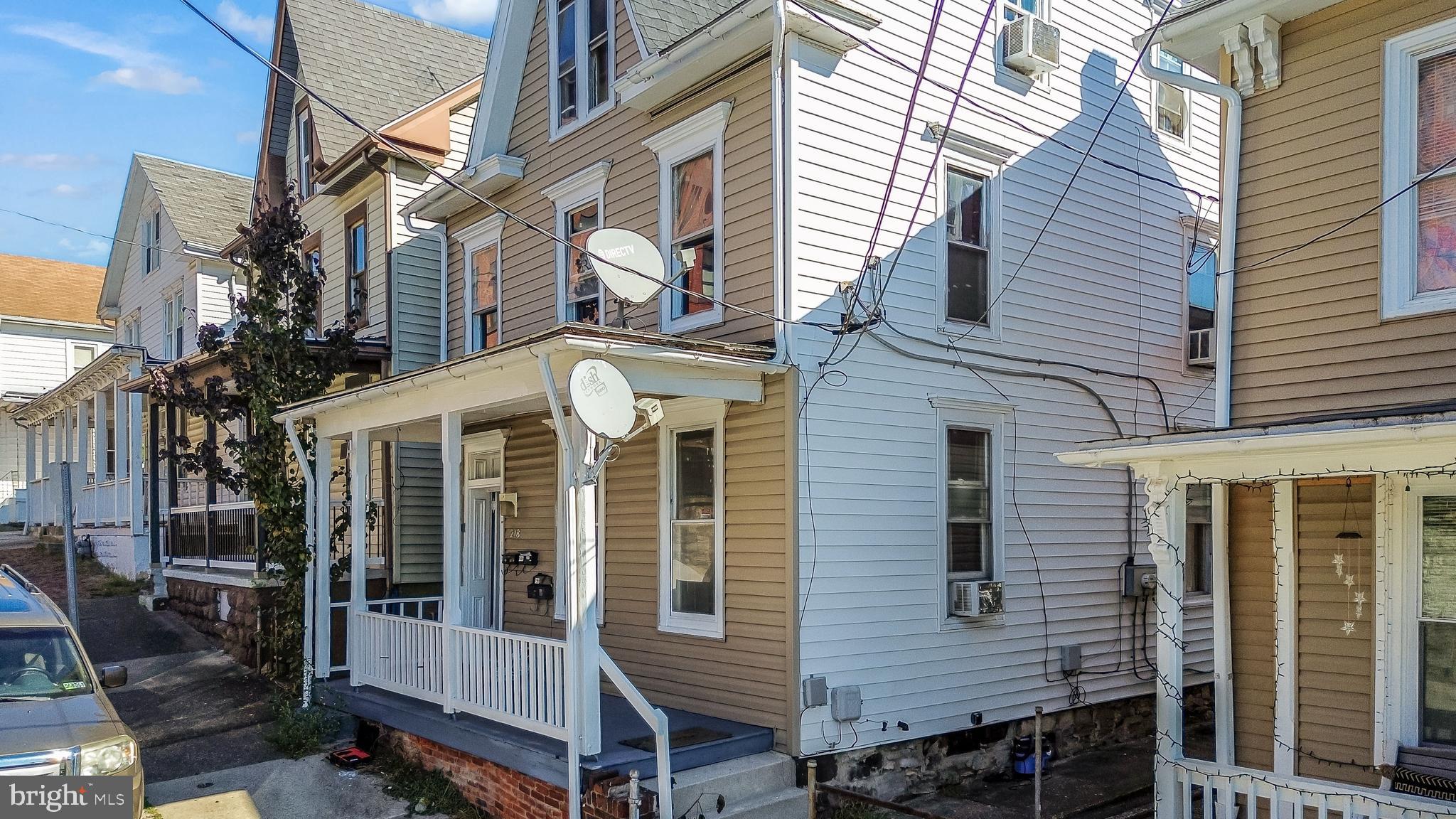218 Elm Street Steelton, PA 17113 - Photo 4 of 22 a view of a wooden house with a large windows