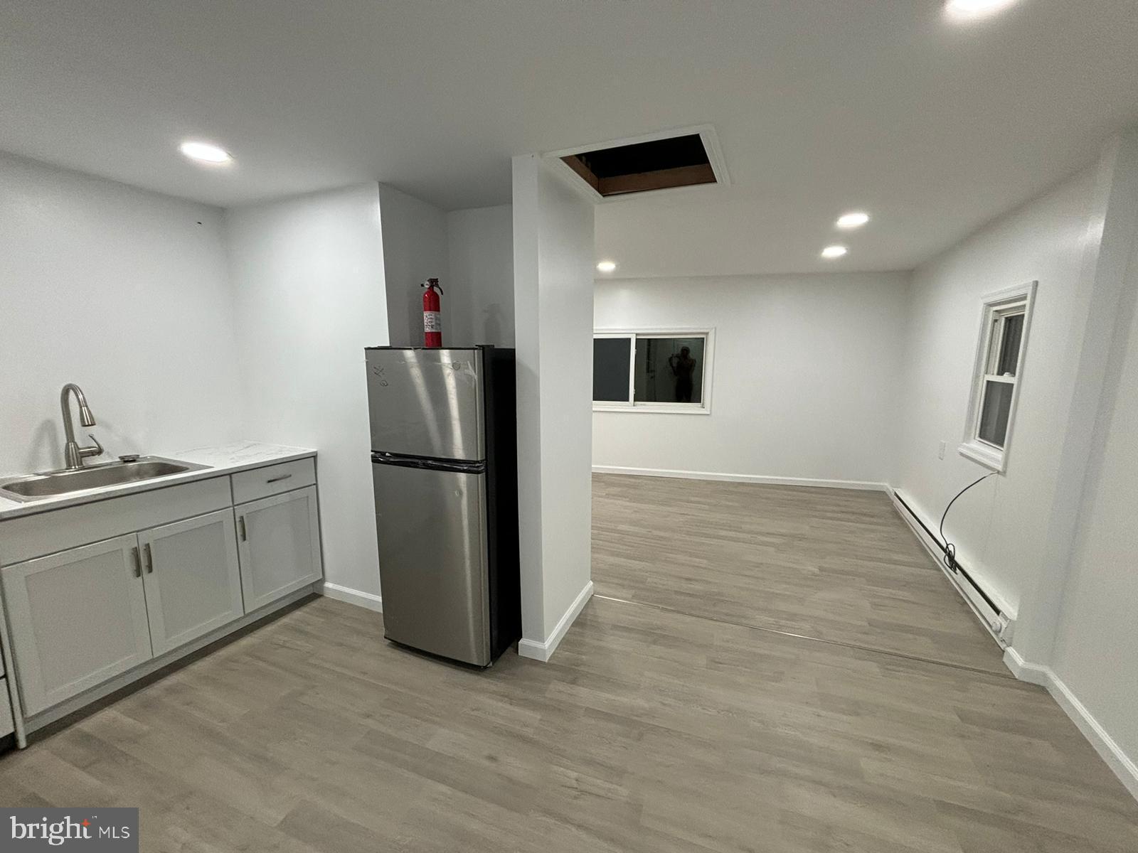 218 Elm Street Steelton, PA 17113 - Photo 8 of 22 a kitchen with stainless steel appliances granite countertop a refrigerator sink and microwave