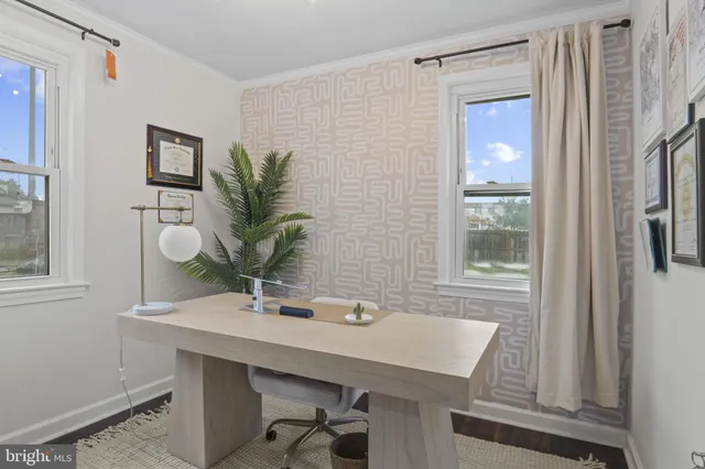 a view of a workspace with furniture