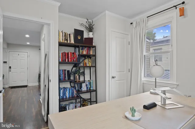 a view of a livingroom with furniture and wooden floor