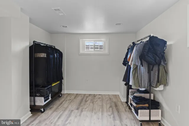 a view of a closet with storage