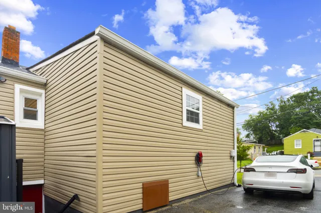 a view of car parked in front of house