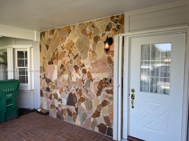 14624 Southwest 143rd Pl Circle Miami, FL 33186 - Photo 1 of 13 a view of bathroom with a shower and a window
