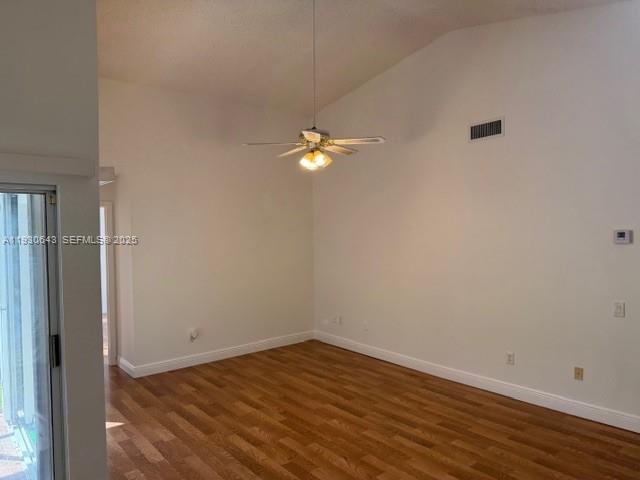 14624 Southwest 143rd Pl Circle Miami, FL 33186 - Photo 5 of 13 wooden floor in an empty room