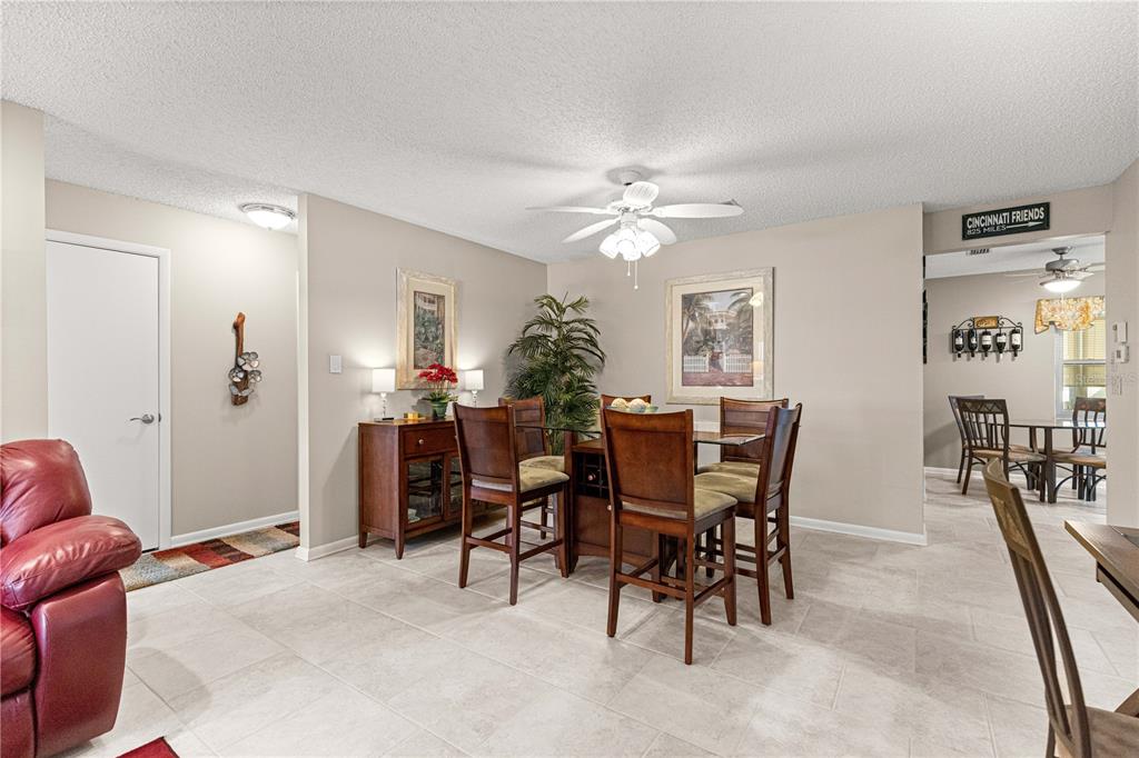 8431 Southwest 93rd Place, Unit G Ocala, FL 34481 - Photo 8 of 50 a view of a dining room with furniture