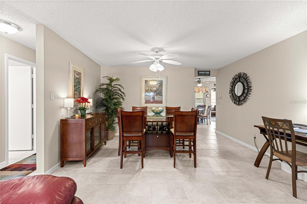 8431 Southwest 93rd Place, Unit G Ocala, FL 34481 - Photo 9 of 50 a view of a livingroom with furniture and a potted plant