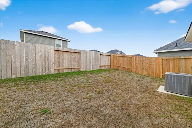 a view of swimming pool patio and outdoor seating