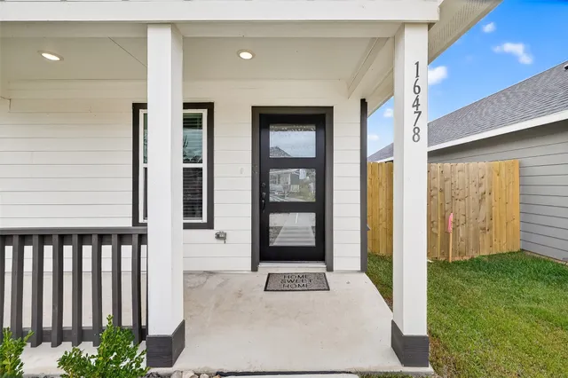 a view of kitchen with wooden floor