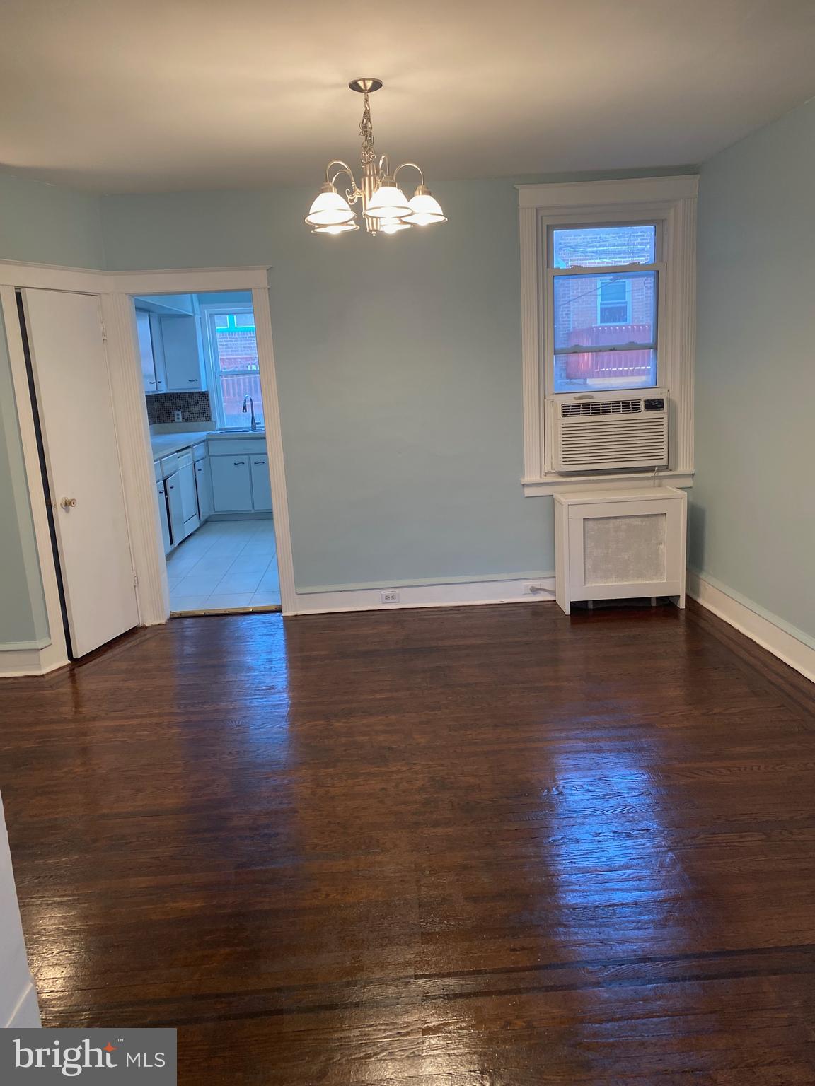 267 Sanford Road Upper Darby, PA 19082 - Photo 6 of 31 wooden floor in an empty room with a window