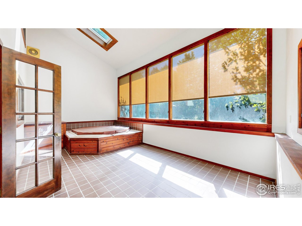 1313 Centennial Road Fort Collins, CO 80525 - Photo 2 of 38 Sunroom Hot tub