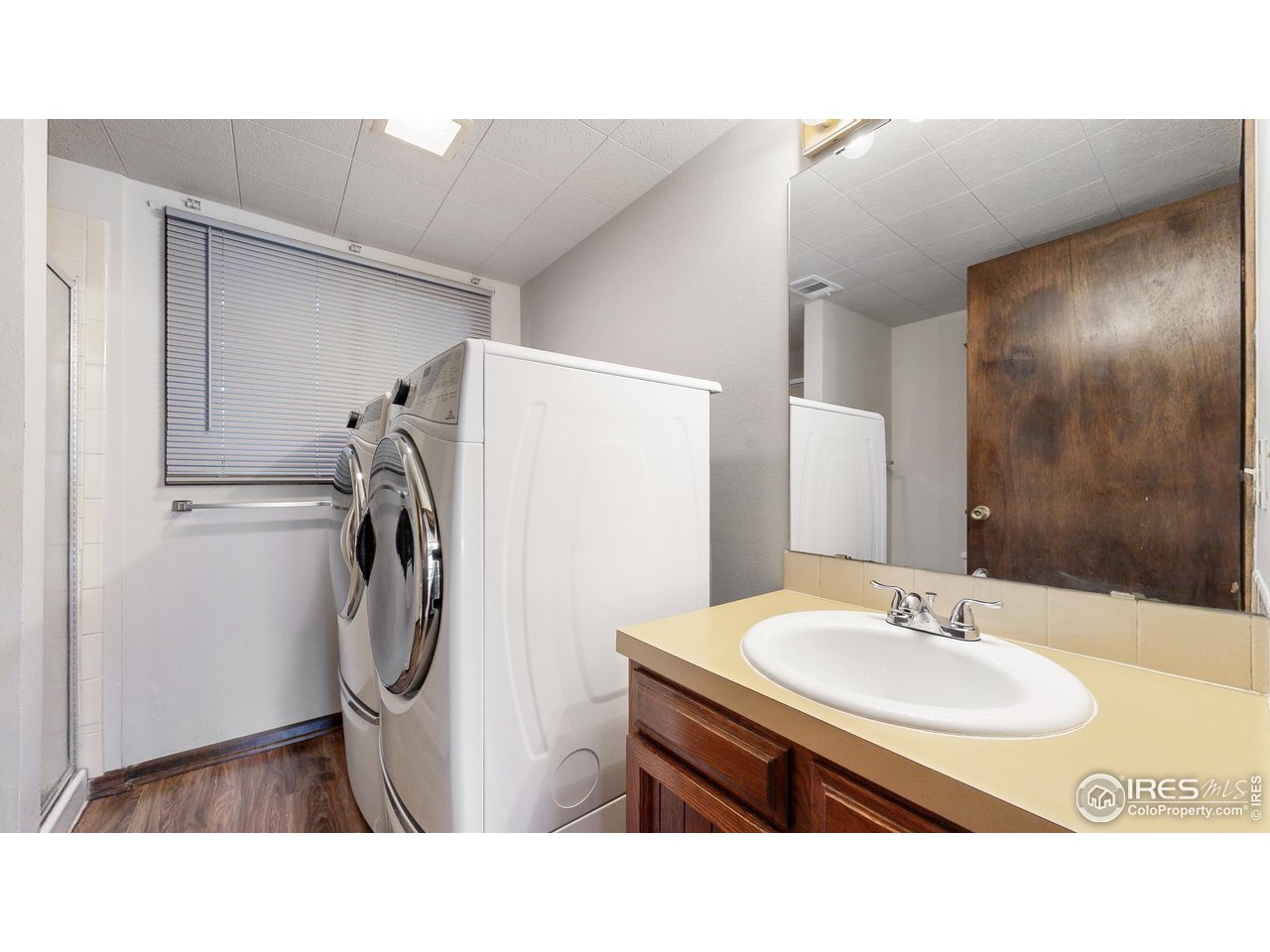 1313 Centennial Road Fort Collins, CO 80525 - Photo 25 of 38 Lower 3/4 Bathroom with Washer and Dryer
