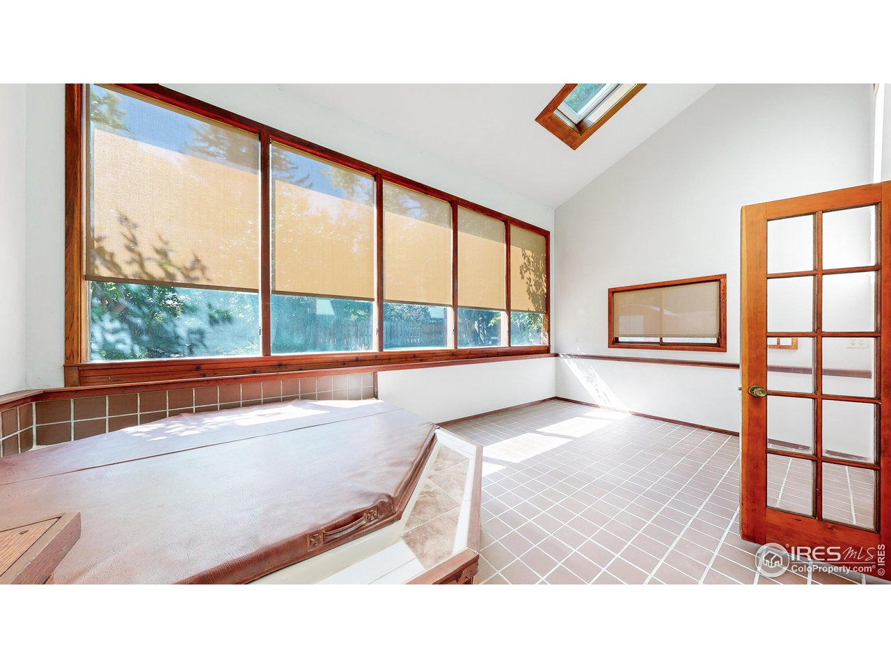 1313 Centennial Road Fort Collins, CO 80525 - Photo 31 of 38 Sunroom Hot tub