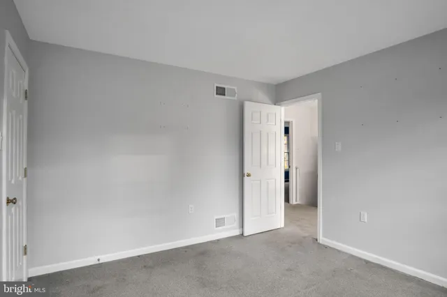 a bathroom with a toilet and sink
