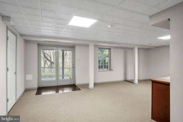 a view of balcony with wooden floor