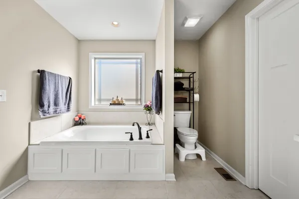 a bathroom with a sink and a large mirror